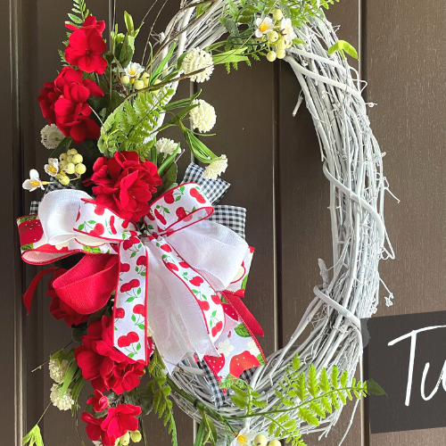 white grapevine wreath with geraniums tutorial