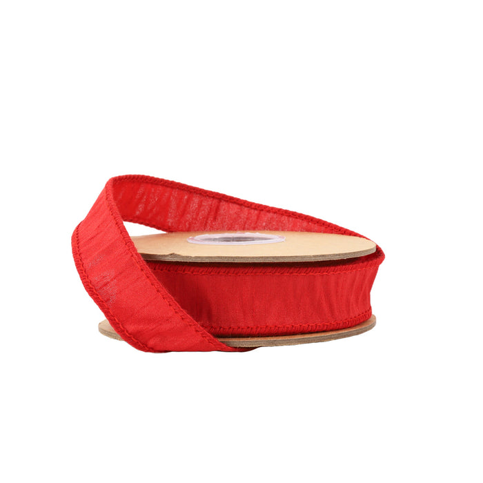 A spool of 1" Red Dupioni Ribbon 9100W-250-25E with a sheer, wired texture is partially unwound and displayed on a plain white background.