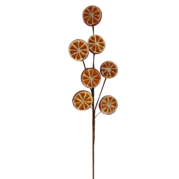 The 20" Faux Orange Slices Spray 31362 is a decorative metal sculpture featuring seven circular discs in cream and orange tones with radial patterns that resemble faux orange slices. These discs are arranged on slender branches, creating an abstract tree-like shape against a plain white background.