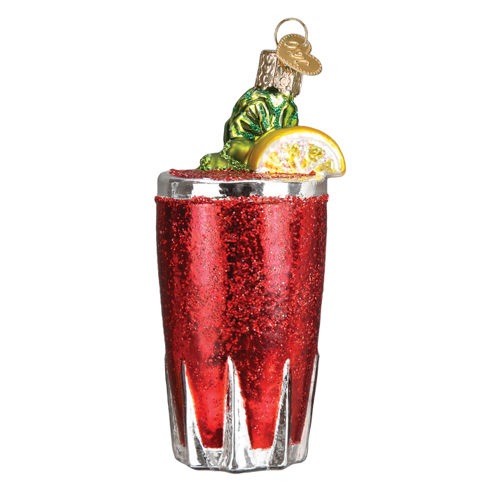 The Bloody Mary Old World Christmas Ornament 32269 features a red glittery drink topped with a green frog and lemon slice garnish—an ideal gift for Bloody Mary fans or as a playful hangover cure reminder.