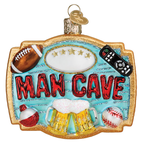 The Man Cave Old World Christmas Ornament 36332 features bold red “MAN CAVE” text, a football, TV remote, baseball, and frothy beer mugs on a blue and gold background—perfect as a men’s gift or unique man cave decor.