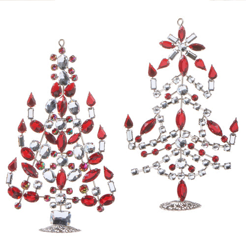 The 6.5" Set of Two Red and Crystal Jeweled Tree Ornaments (Product 4313525) features ornamental Christmas trees adorned with red and clear gemstones, silver accents, and complex patterns of teardrop and oval shapes. Made from metal and plastic, these ornaments bring a festive yet sophisticated touch to your holiday décor.