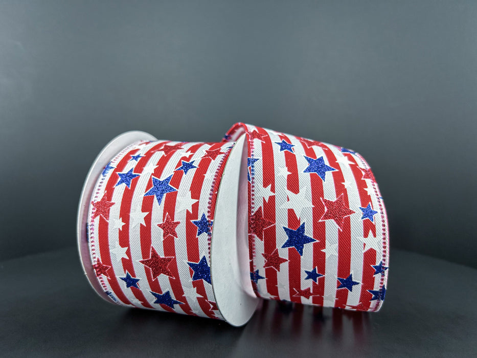 Two rolls of 2.5X10Y White Red and Blue Linen Striped Glitter Stars Ribbon feature an American flag theme with red and white stripes, blue stars, and a dark gray background.