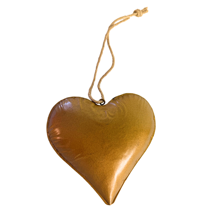 The 6.5 by 6.5 Antique Gold Metal 3D Heart (570752) features a shiny gold finish and comes with a rustic jute loop for hanging, shown against a white background.