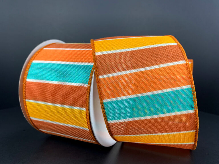A roll of 2.5X10Y Aqua-Orange-Rust-Yellow-White Stripe Linen Ribbon 61317-40-45 sits on a black surface, slightly unrolled to highlight its vibrant pattern and contrasting colors.
