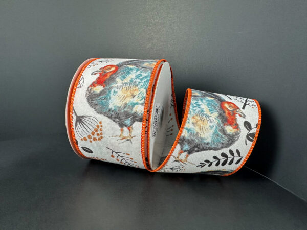 The 2.5X10Y White Ponche Satin/Watercolor Turkeys Ribbon (61504-40-18) features colorful turkey and botanical illustrations with orange-edged borders on a white satin background.