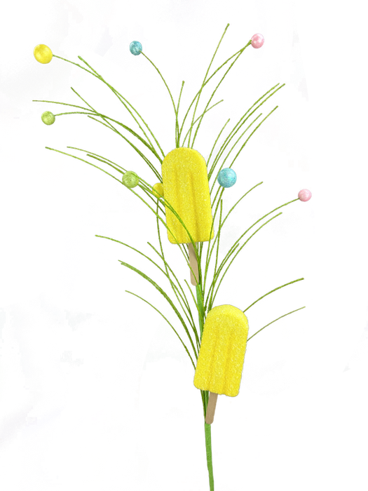 The 30\ Yellow Popsicle Spray 2 Stems 63397YW features two yellow popsicles as flowers with round candies on green stems, set against an abstract multicolored background, creating a vibrant and whimsical scene.