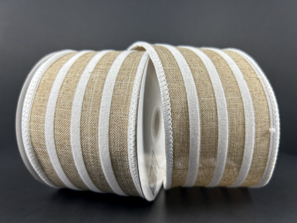 Two rolls of 2.5 x 10yd Natural Linen/White Flocked Cabana Stripe Ribbon (72416-40-15), featuring bold tan and white stripes with crisp white edges, are displayed side by side on a dark background.