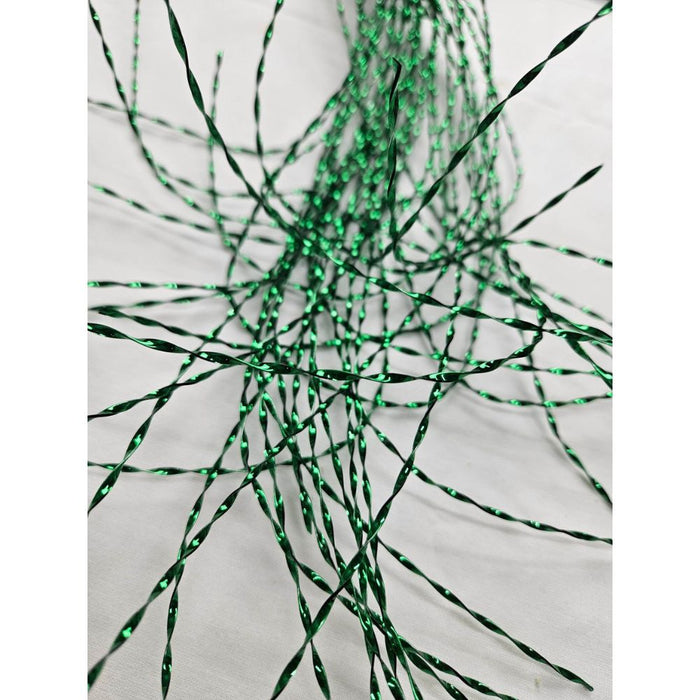 Close-up of twisted, shiny green wires with a metallic stripe, scattered on a white surface—perfect for creating the 39 Green Metallic Stripe Hanging 82315-GN decoration.