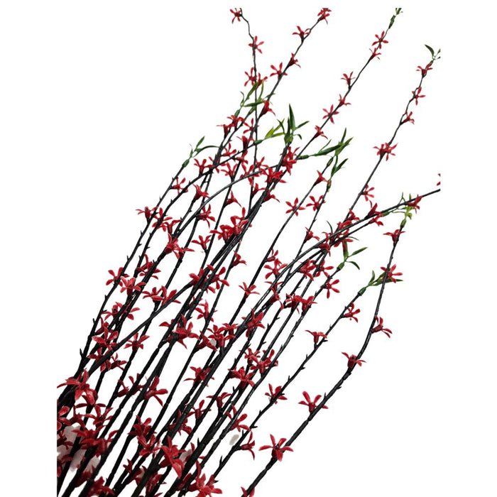 The 35 Red Plastic Spray 83670-RD features slender branches with small red flowers and green leaves, beautifully contrasted against a white backdrop.