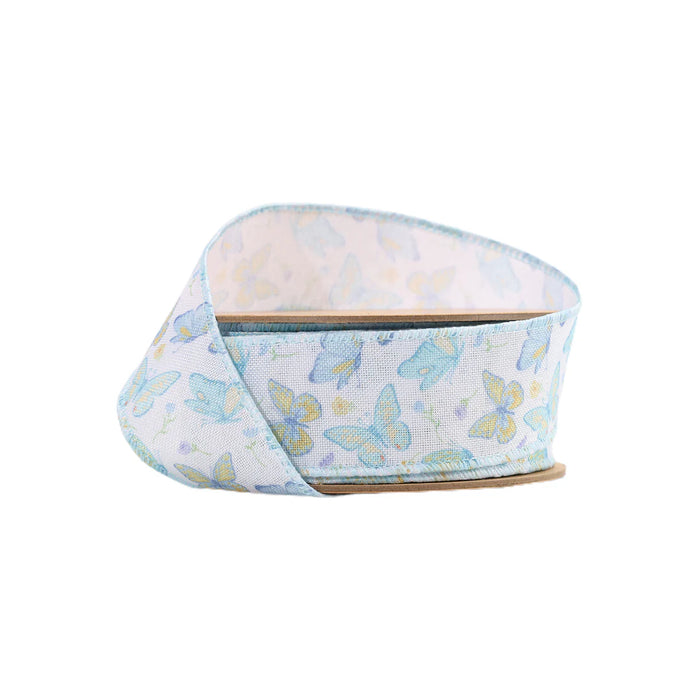 The 1.5 White and Blue Butterflies Ribbon (9331W-029-38E) features light blue and yellow butterflies on a white background, beautifully wound in a loop with one end slightly raised, ready for your next creative project.