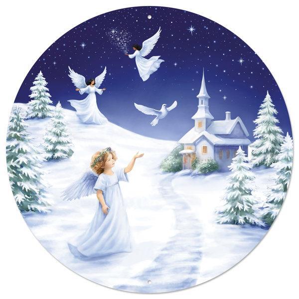 A young angel gestures toward two flying angels and a dove above a lit-up church and pine trees in a snowy blue, green, and white winter scene on the 12 Diameter Angel With Winter Scene Sign MD1668.