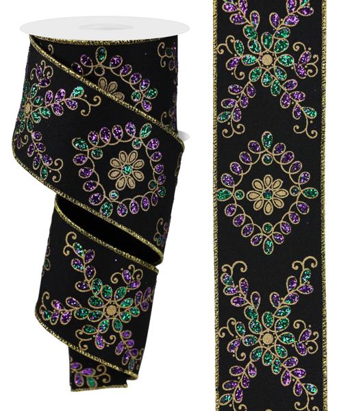 The 2.5 X10Yd Black/Mardi Gras Ornate Loop Diamond Ribbon RGE192402 features black fabric with intricate gold, purple, and green glitter floral and diamond patterns, finished with elegant gold-trimmed edges along its length.