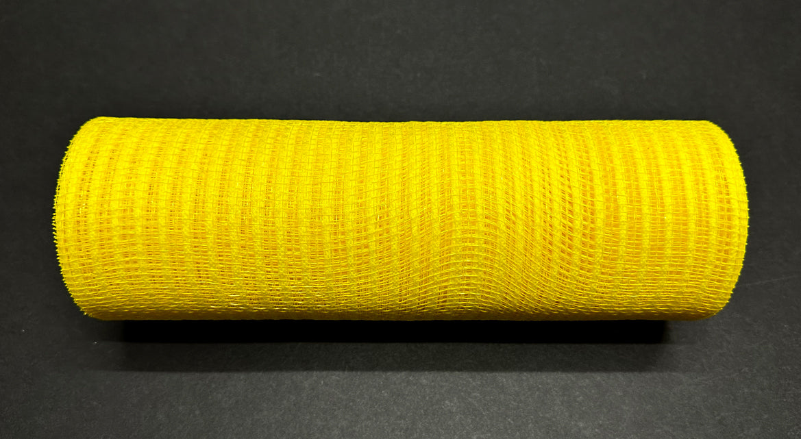 A roll of the 10"X10Y Daffodil Breeze Solid Mesh, identified as XB240710-22, is set against a dark background. The fabric features a grid-like pattern, with its soft and flexible texture highlighted by the lighting that casts a shadow underneath.