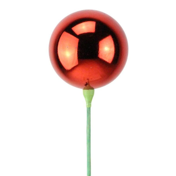 A 100mm V.P. Ball on a bamboo pick, standing 20" in overall length and featuring a shiny red finish (XP365224), resembles a small decorative bauble.