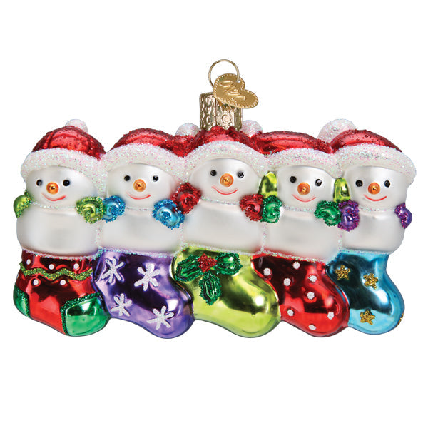 Five cheerful snowmen in Santa hats sit in festive stockings, forming the Snow Family Of 5 Ornament (Old World Christmas 24219), a charming, personalized Christmas decoration inspired by Old World tradition.