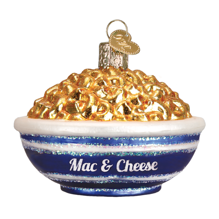The Bowl Of Mac & Cheese Ornament by Old World Christmas (32258) captures the essence of comfort food with a shiny finish, featuring Mac & Cheese on a blue and white bowl. A metallic loop on top allows for easy hanging.