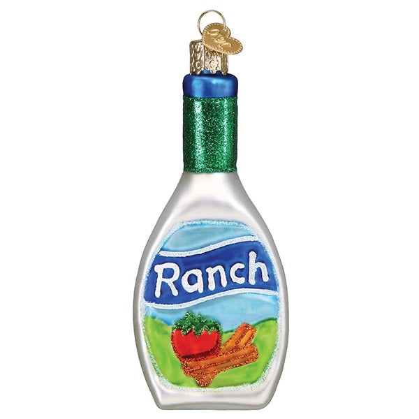 The Ranch Dressing Old World Christmas Ornament 32443 is a festive ranch dressing bottle with a blue label stating Ranch Dressing and features images of tomatoes and vegetables, capturing the essence of everyones favorite salad dressing.
