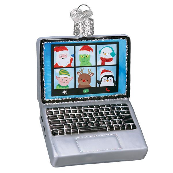 Celebrate together from afar with the Virtual Friends Old World Christmas Ornament 32523—a silver laptop showing a festive video call with Santa and friends. Comes in a gift box, perfect for easy holiday giving!.