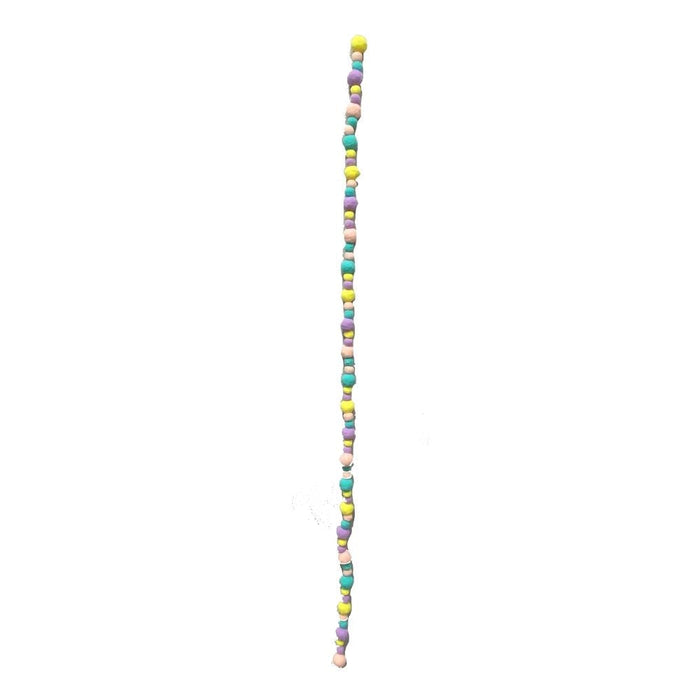 A stunning 4' Pastel Felt Ball Garland features a long string of colorful, round beads in soft pastel hues such as yellow, pink, blue, and green, evenly spaced along the strand against a plain white background.