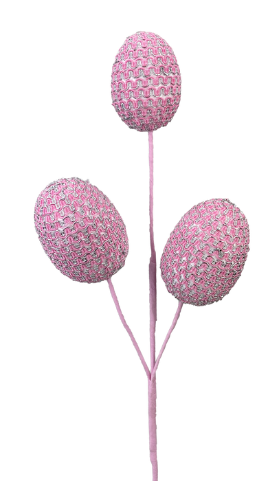 A cluster of the 16" Pink Egg Pick with three stems (product code 63203PK) showcases egg-shaped objects with a woven texture, set against a black background. The soft pastel pink hue offers a gentle contrast that highlights their delicate allure.