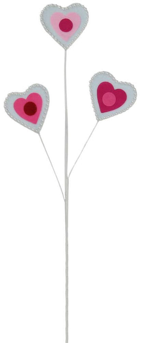 Introducing the 24.5"L Pearl Bead/Felt Heart Spray in White/Multi Pink (HV0267), featuring a decorative stick adorned with three heart-shaped felt ornaments. Each heart displays layers of white and a variety of pink hues, highlighted by central pink circles, and finished with delicate pearl bead accents for an elegantly minimalistic appearance.