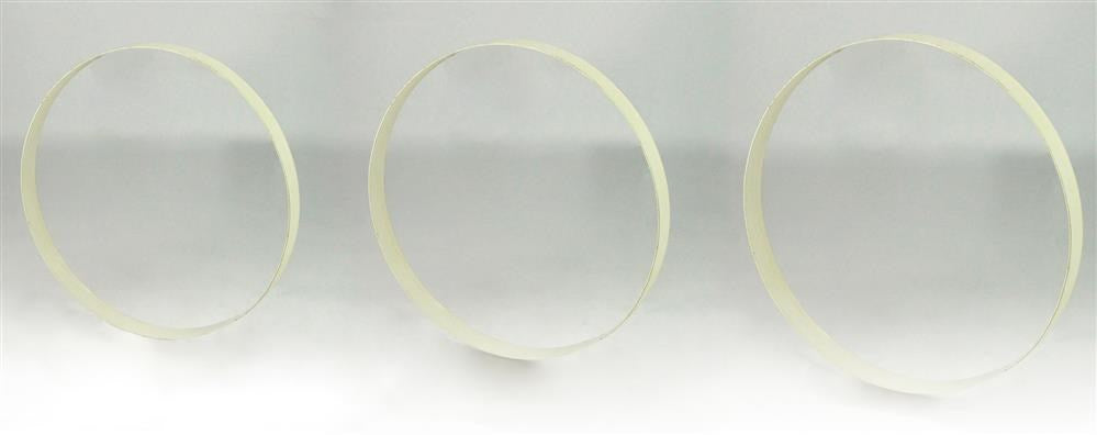 Three S/3 15.75-17.75"Dia Metal Wreath Rings in Antique White (MD0685K6) stand upright and evenly spaced on a pale, misty surface, with a light gray background, appearing to float or lightly rest on the scene.