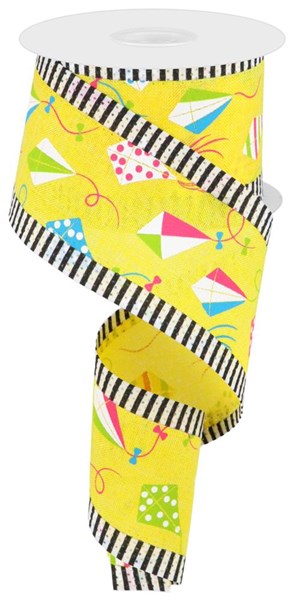 The 2.5X10YD Kites On Royal/Stripe Edge ribbon features vibrant kite designs in yellow, white, lime, turquoise, and black against a striped edge. Partially unrolled and coiled in a loose spiral, it adds a playful touch to any craft project. Product ID: RG089988N.