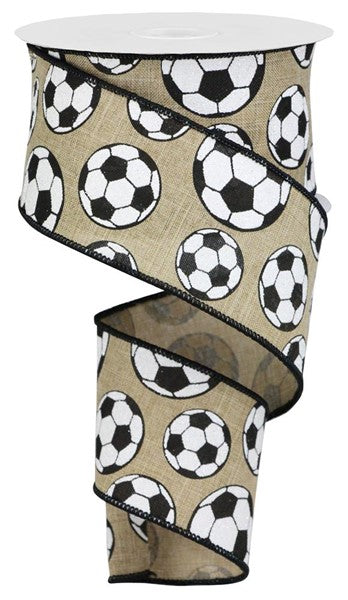 The 2.5 x 10 yd RGA115801 royal ribbon in light beige features black edges and a repeating pattern of black and white glitter soccer balls for a sporty touch.