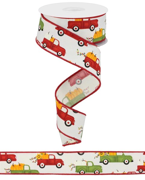 The 1.5X10Yd Pumpkin Trucks ribbon spool (Ivory/Moss/Red/Orange/Black, RH013337) features playful pumpkin trucks and a red border, partially unrolled in a zigzag shape.