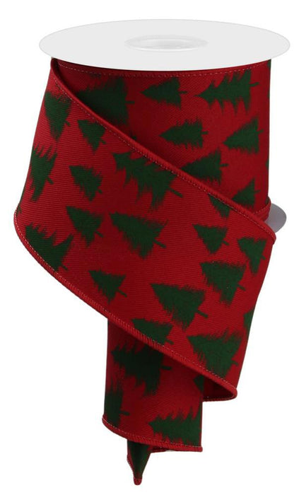 A partially unwound spool of 2.5X10Yd Wispy Trees Red/Dk Green RGE135824 ribbon, festively decorated and curling downward.