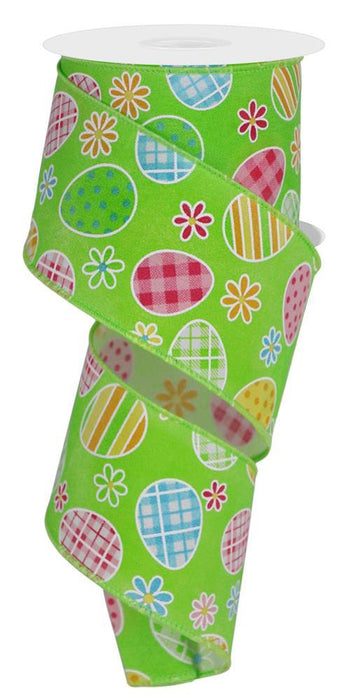 The RGE1406A4 is a 2.5 x 10-yard roll of ribbon in green, blue, lime, pink, gold, and yellow. It features check plaid patterns with Easter eggs and daisies. The design is vibrant and festive even when partially unrolled.