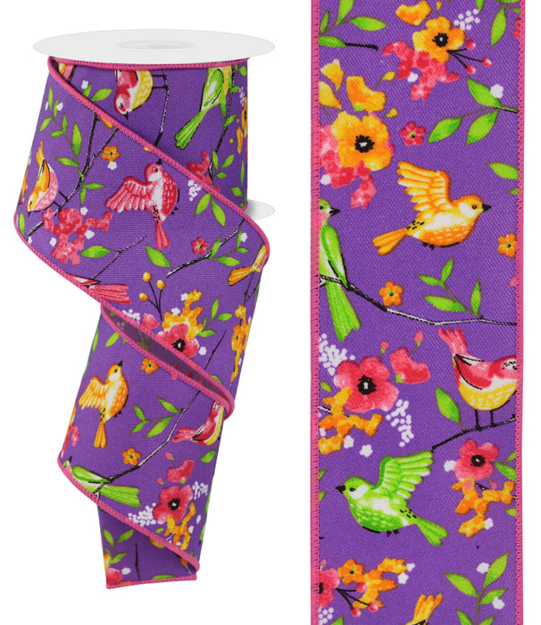 The 2.5X10Yd Ribbon (RGE176023) displays colorful birds perched on floral branches set against a purple background, with pink, yellow, and green birds among orange and pink flowers, creating a lively nature-inspired design.