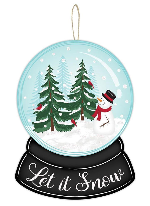 The 12H x 9L Let It Snow Glitter Snow Globe (AP8912) features two evergreen trees, red birds, and a smiling snowman in a black hat and red scarf. Its MDF base reads Let it Snow as snowflakes shimmer inside the globe.