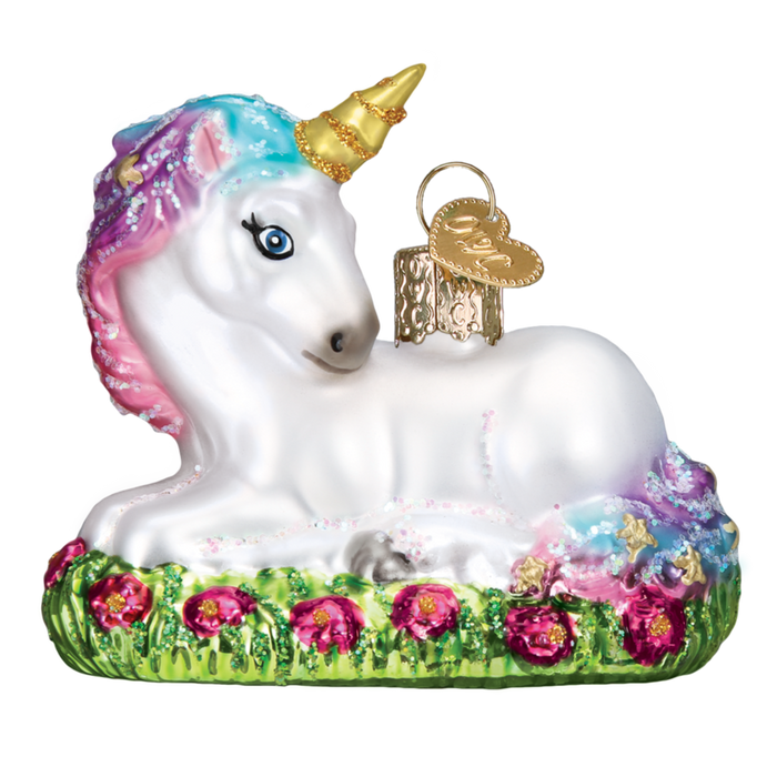 The Baby Unicorn 12534 Old World Christmas Ornament is a charming hand-painted glass figurine featuring a whimsical baby unicorn with a golden horn, resting elegantly on a grassy base embellished with pink flowers. Its rainbow-colored mane and small golden tag suggest magical powers, offering an enchanting touch to any collection.