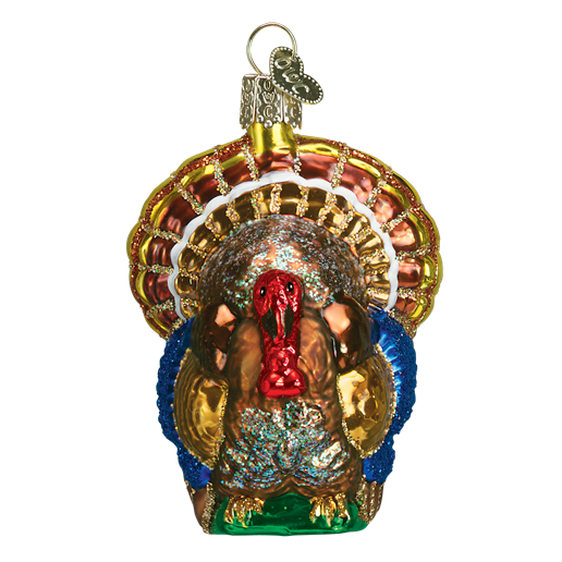 The Tom Turkey 16015 Old World Christmas Ornament features a colorful turkey with a bright red wattle, blue wings, gold accents, and a decorative loop on top for hanging.
