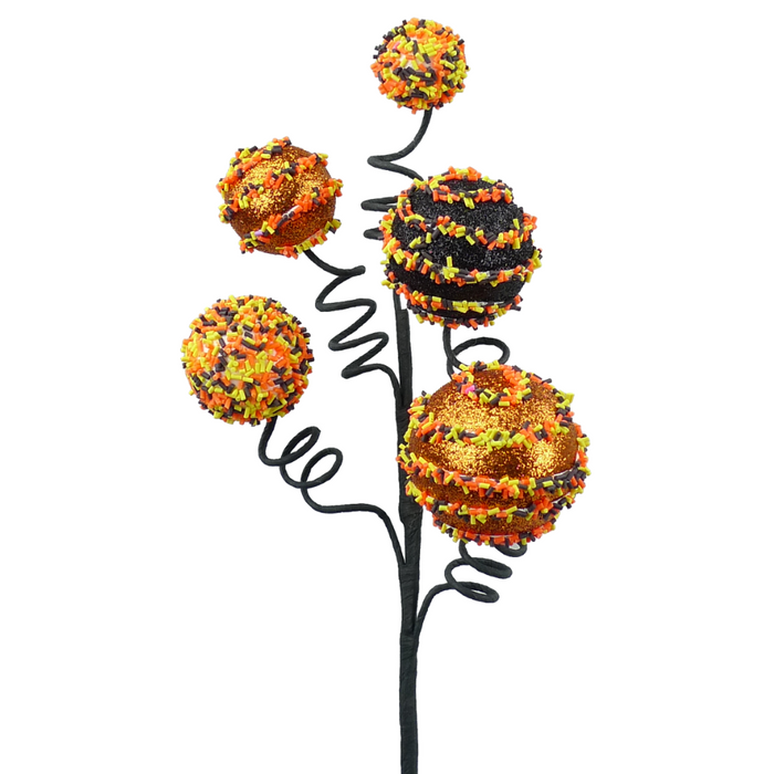 The 16 Halloween Cake Pop with Sprinkles Spray (56573SP16) features spheres resembling festive cake pops on black wire stems. Decorated with orange, black, and yellow sprinkles, the sprays spiraled wires add a whimsical holiday touch.
