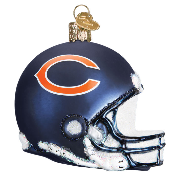 The Chicago Bears Helmet 70617 Ornament from Old World Christmas is a hand-painted glass piece shaped like a football helmet, featuring a navy blue design with an orange C logo on the side and gold detailing, perfectly celebrating the Chicago Bears.