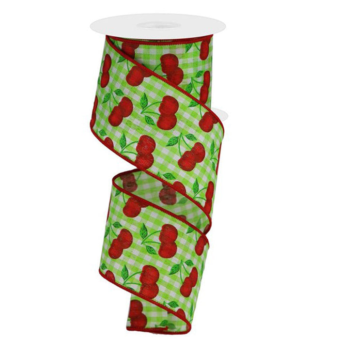 The 2.5 Green White Gingham Check Cherries Ribbon RGA1650EM features a green and white check pattern, red cherries with green leaves, a red-edged border, and a subtle wire edge for easy shaping.