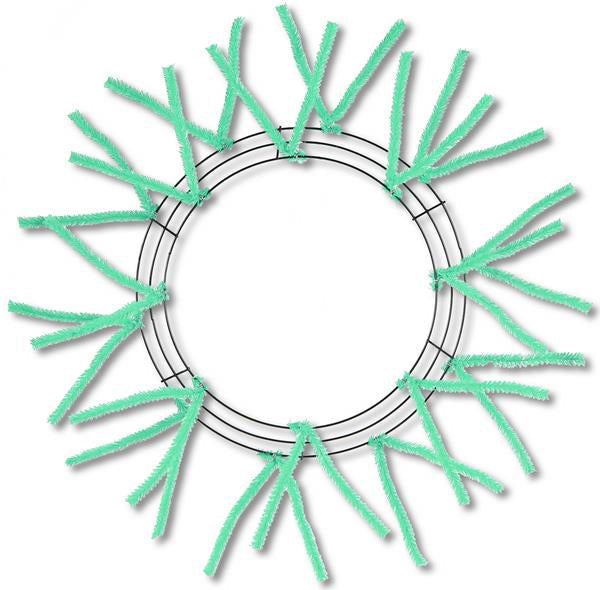 The 24 Pencil Wreath Seafoam Green Non-Metallic XX750470 features a circular design with seafoam green pipe cleaners radiating outward on a white background, highlighting its simplicity.