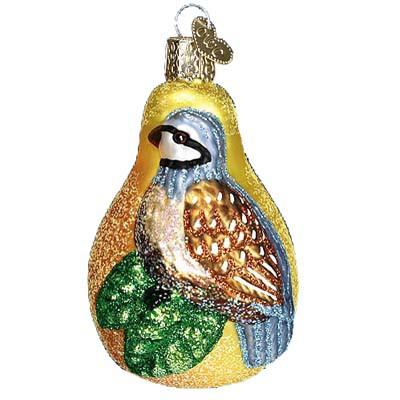 The Partridge in a Pear 16070 Old World Christmas Ornament is a glass ornament with a shiny golden pear, a detailed bird on glittery green leaves, and includes a metal loop for easy hanging.
