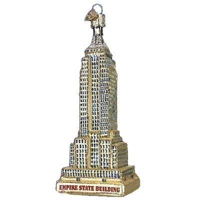 The Empire State Building 20059 Old World Christmas Ornament features a hanging loop and a base with "Empire State Building" signage—ideal for NYC collectors or as a festive holiday decoration.