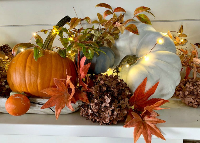Fall Mantel with Persimmons and Pumpkins