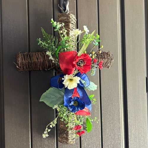 twig cross updated with a red white and blue floral spray