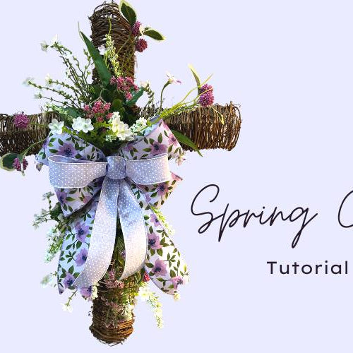 spring florals on a twig cross with lavender bow