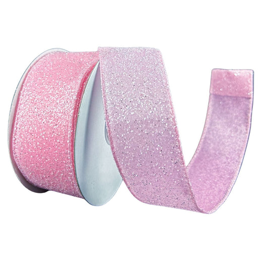 1.5" light pink ribbon with a candy glitter finish and wired edge, shown partially unrolled on a spool.