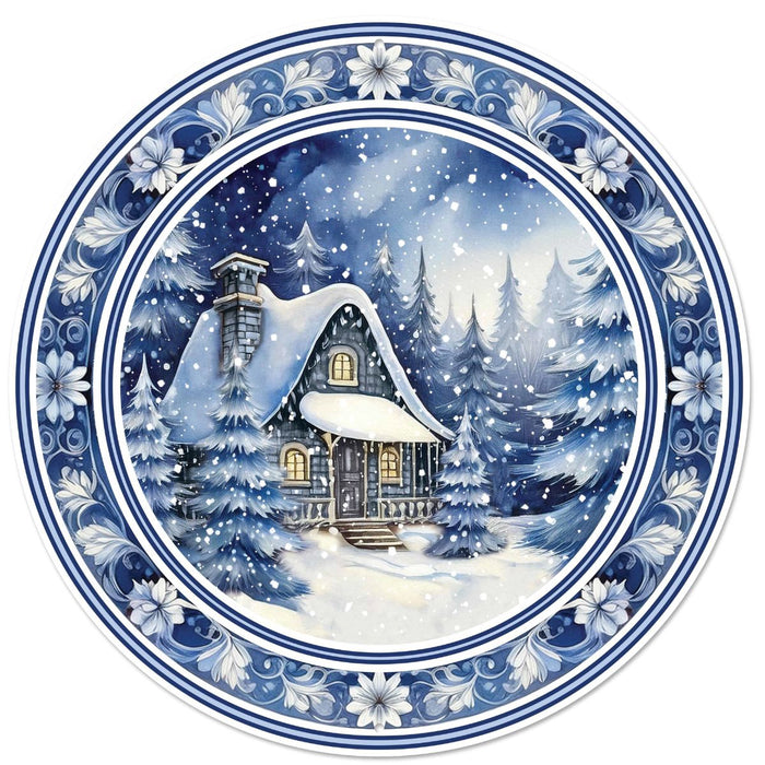 12 inch round metal sign with blue and white winter cabin scene, Chinoiserie style, available at Trendy Tree
