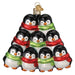 Glass Penguin Family of 9 Old World Christmas Ornament 16156 shaped like a pyramid of nine penguins wearing red and green scarves.