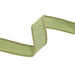 A close-up of the 1″ Designer Moss Dupioni Wired Ribbon 9100W-570-25E, featuring light green dupioni fabric with brown stitched edges, twisted into an S-shape against a white background. Ideal for adding texture and elegance to autumn wreaths.