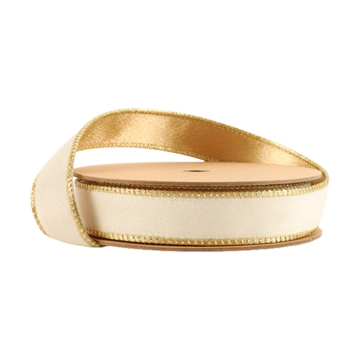 A partially unrolled spool of 1" Ivory and Gold Reversible Classic Velvet Ribbon (7115W-810-25E) with gold-trimmed edges rests on a white background.